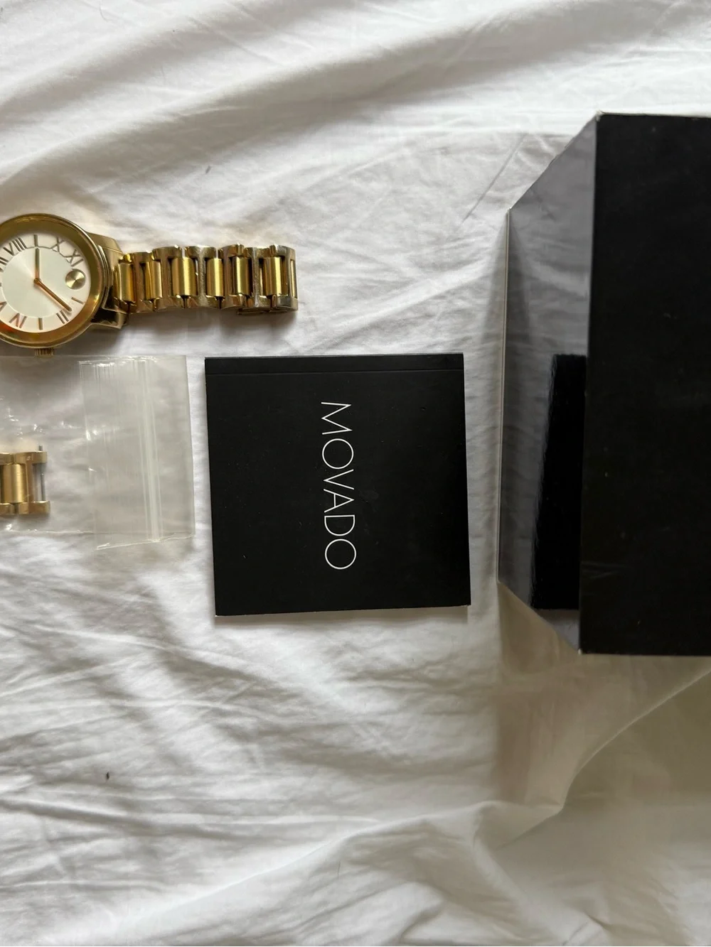 Movado Bold gold watch with box and card